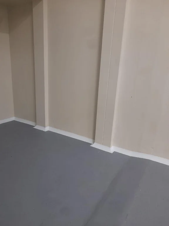 Fotografía real: Terminación sanitaria en esquina